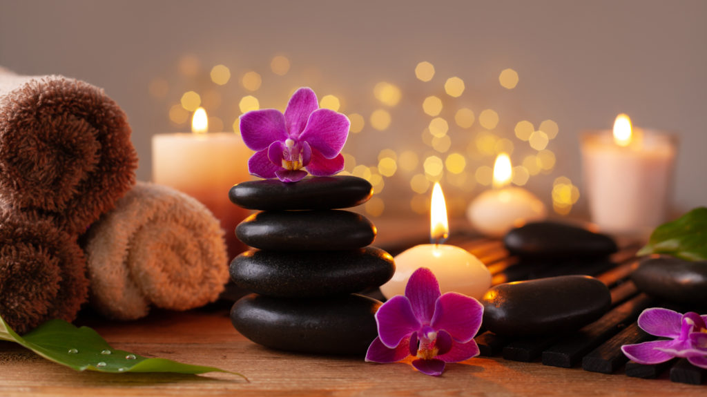 Spa, beauty treatment and wellness background with massage stone | Thrive Wellness in Cummings Hwy, Chattanooga, TN
